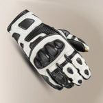 Back view of black/white Sector Pro ST glove featuring TPR protectors on fingers, Superfabric overlays, and perforated leather ventilation.