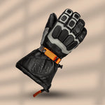 Fly Racing Glacier leather motorcycle gloves in black with yellow detailing, providing warmth, protection, and flexibility for cold-weather riding
