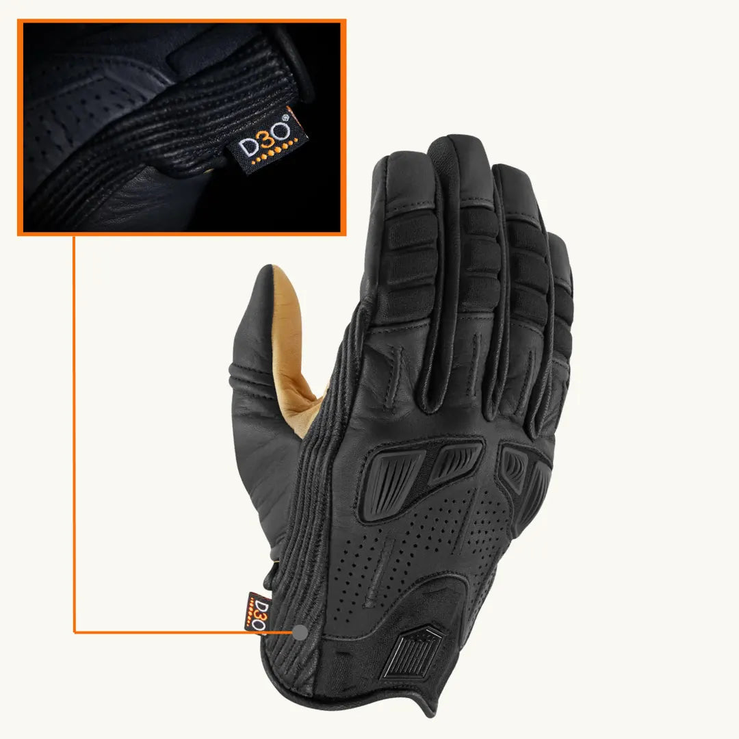 Detail shot of the backhand of Icon Axys motorcycle gloves, featuring debossed neoprene and metal logo 