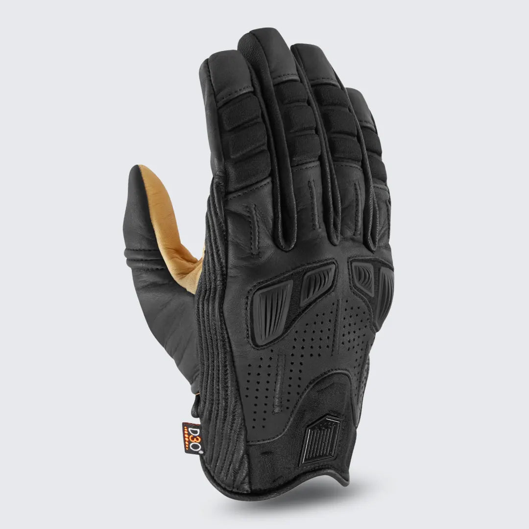 Pair of Icon Axys leather motorcycle gloves in black and gold, showcasing protection and style.