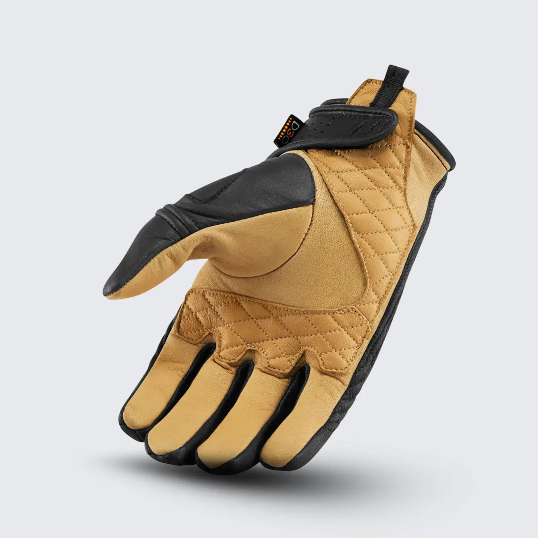 Striking gold accent detailing on the Icon Axys premium leather motorcycle gloves.