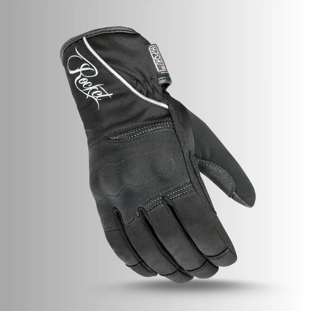 Black Joe Rocket Ballistic Ultra Women's motorcycle gloves with HiPora waterproofing and reflective Rocket logo, featuring knuckle armor and adjustable cuff for riding safety and comfort