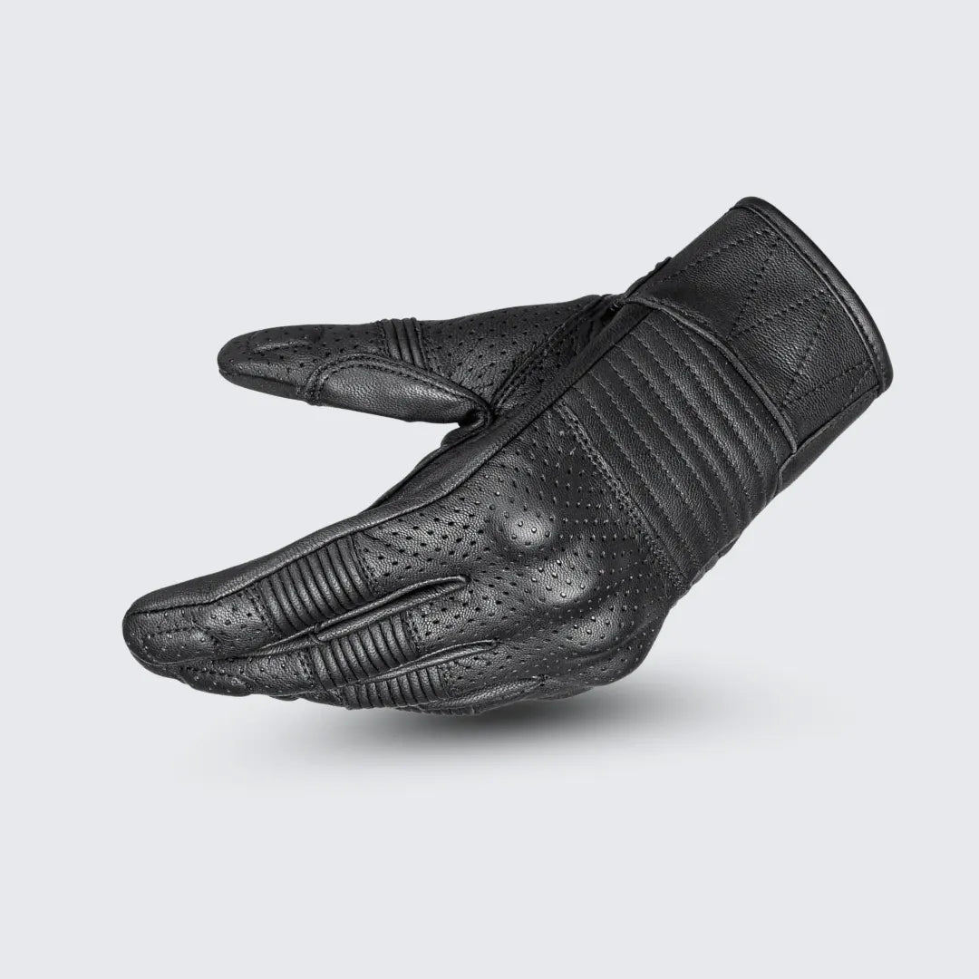 Side profile of black Cortech Bully 2.0 leather motorcycle glove, demonstrating adjustable hook and loop wrist closure.

