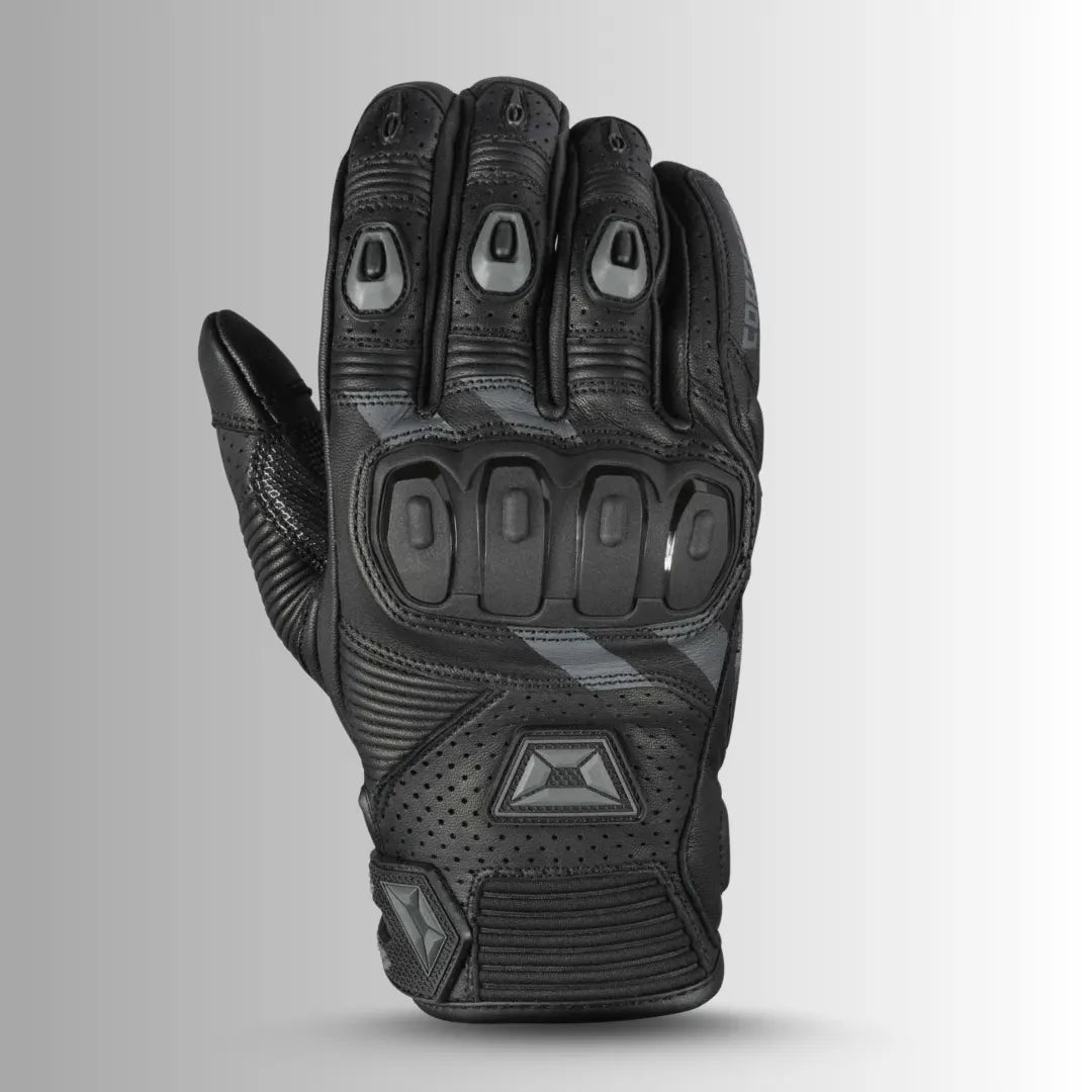 Close-up of Cortech Men’s Manix ST leather motorcycle gloves, showcasing knuckle protection, wrist adjustment, and durable leather