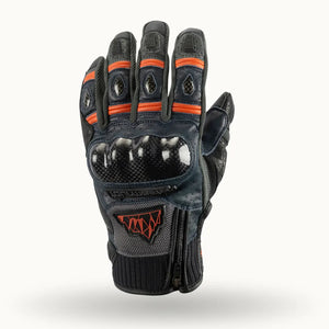 Fly Ignitor Pro Men’s Heated Motorcycle Gloves in Black with Orange Liner — back view with alternative background highlighting knuckle protection and touchscreen fingertips