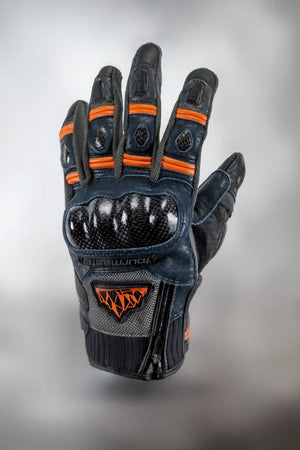 Fly Ignitor Pro Men’s Heated Motorcycle Gloves in Black with Orange Liner — upside-down back view showing integrated hard knuckle armor and reflective accents