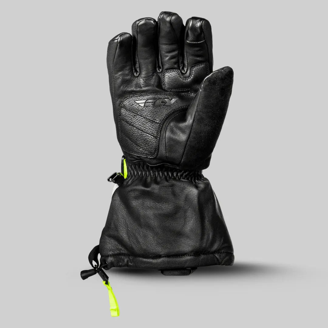 "Fly Racing Glacier leather motorcycle gloves in black with orange accent, featuring ergonomic design and adjustable wrist strap for a perfect fit