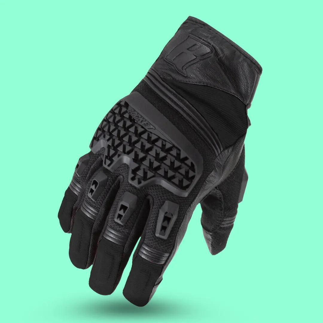 Upside-down rear view of Joe Rocket Tactile glove in solid black Free Air™ chassis, highlighting super-flex molded knuckle protection and SmartTouch™ index finger