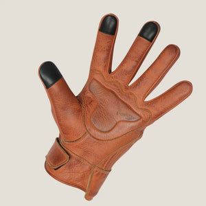 Men's premium brown leather perforated motorcycle gloves worn on hand, showcasing comfort, breathability, and excellent grip for riders fingertips palm padded.