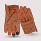 Close-up of premium brown leather perforated motorcycle gloves, highlighting the waxed leather finish and ventilation holes for improved airflow.