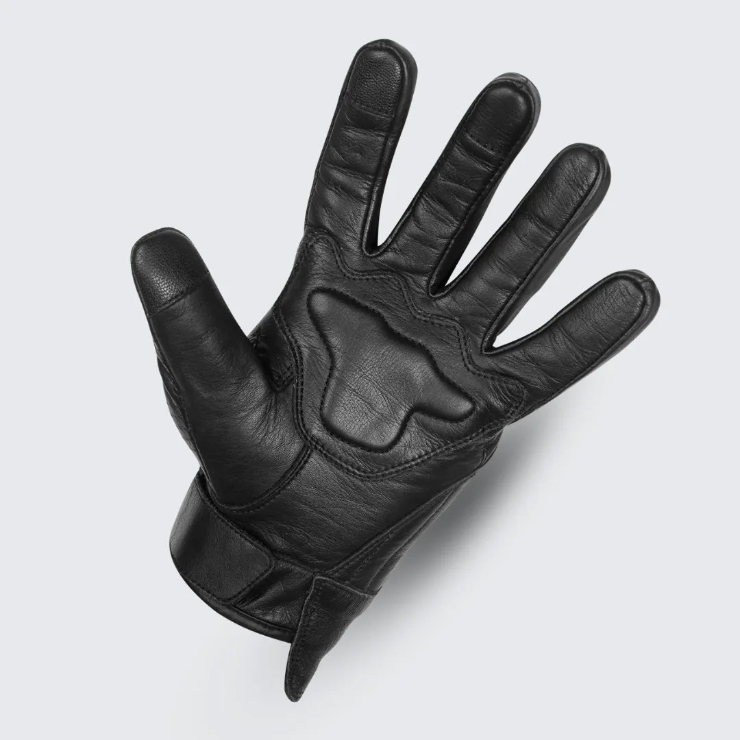 Close-up of men's premium leather perforated motorcycle glove showing padded gel palms for better grip and comfort during rides.