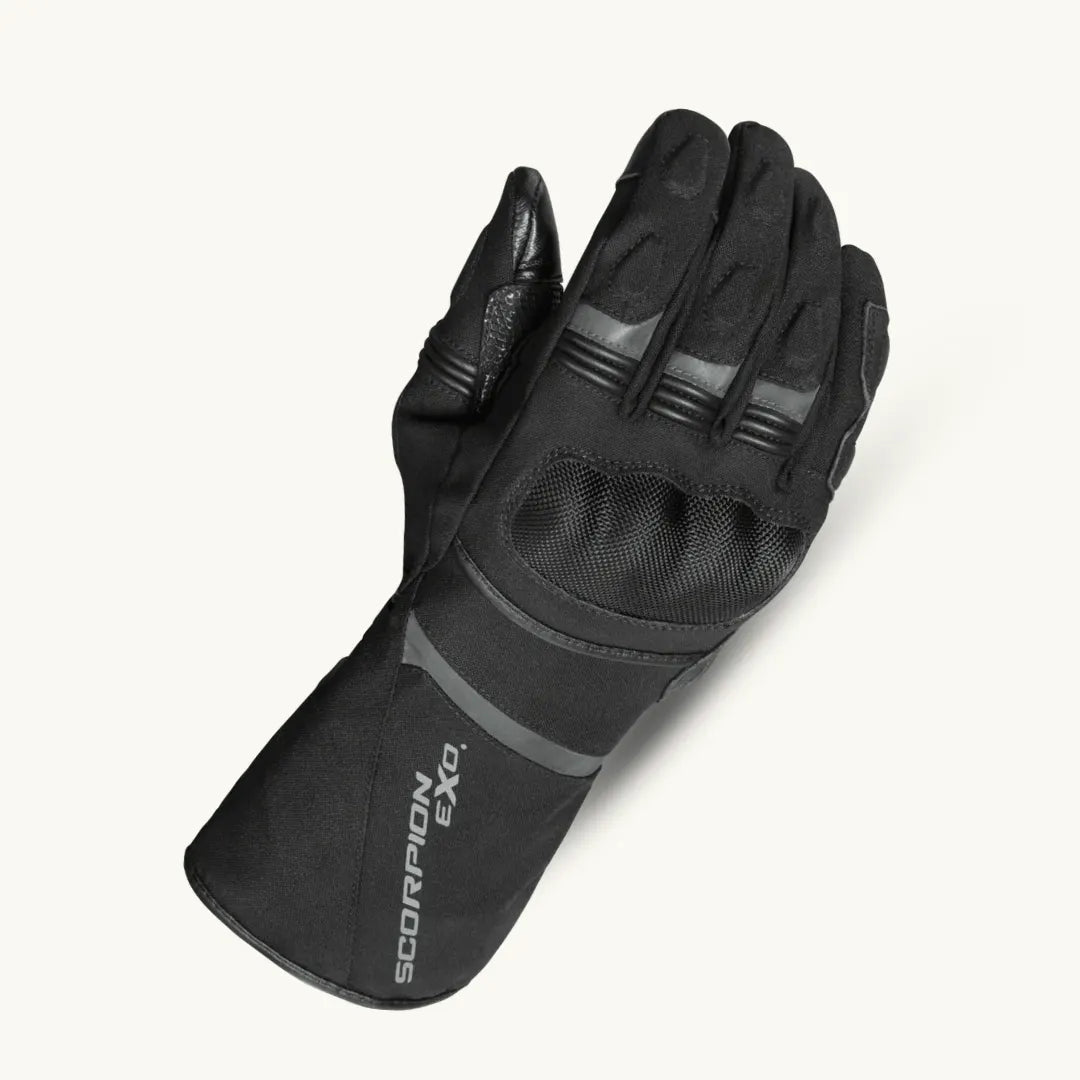 Close-up of Scorpion Tempest II Motorcycle Gloves showing double gauntlet cuff, reflective details, and EXO branding, highlighting waterproof and cold weather features