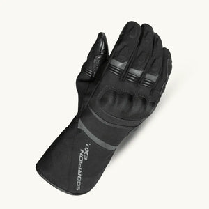 Close-up of Scorpion Tempest II Motorcycle Gloves showing double gauntlet cuff, reflective details, and EXO branding, highlighting waterproof and cold weather features