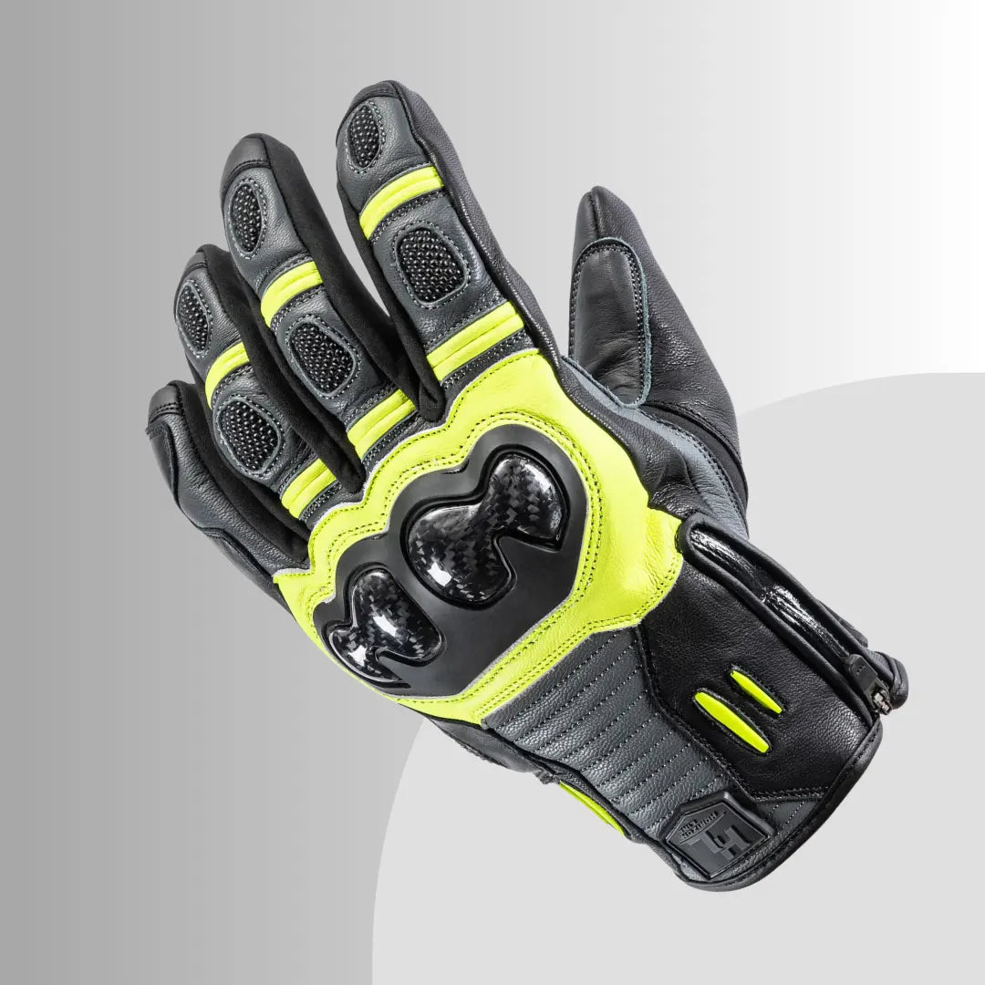 "Back view of hi-vis yellow and black Tour Master Horizon Line Trailbreak glove with goatskin leather, reflective accents, and reinforced knuckle armor."