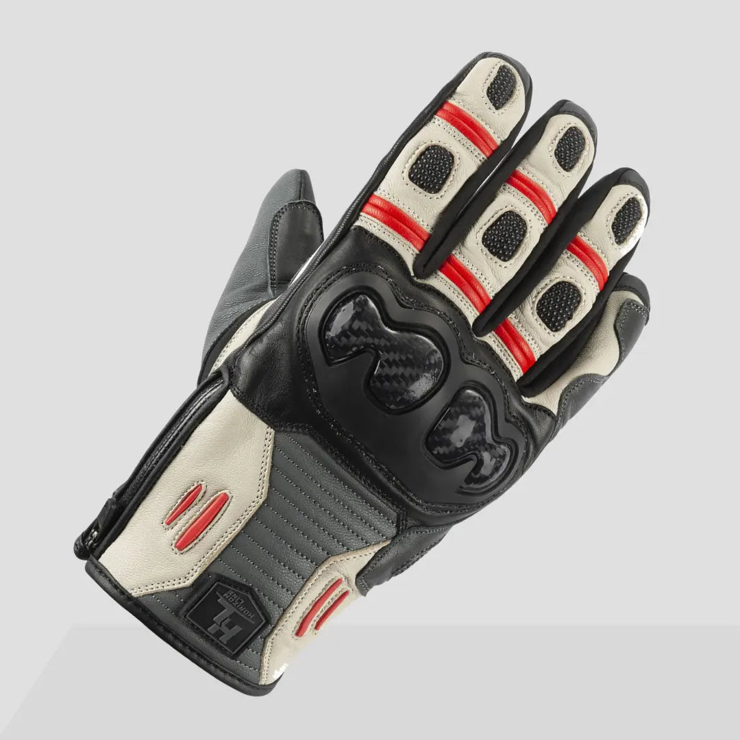 Rear side view of white and black Tour Master Horizon Line Trailbreak glove with red accent lines, carbon-fiber knuckle protection, and stretch softshell fourchettes.