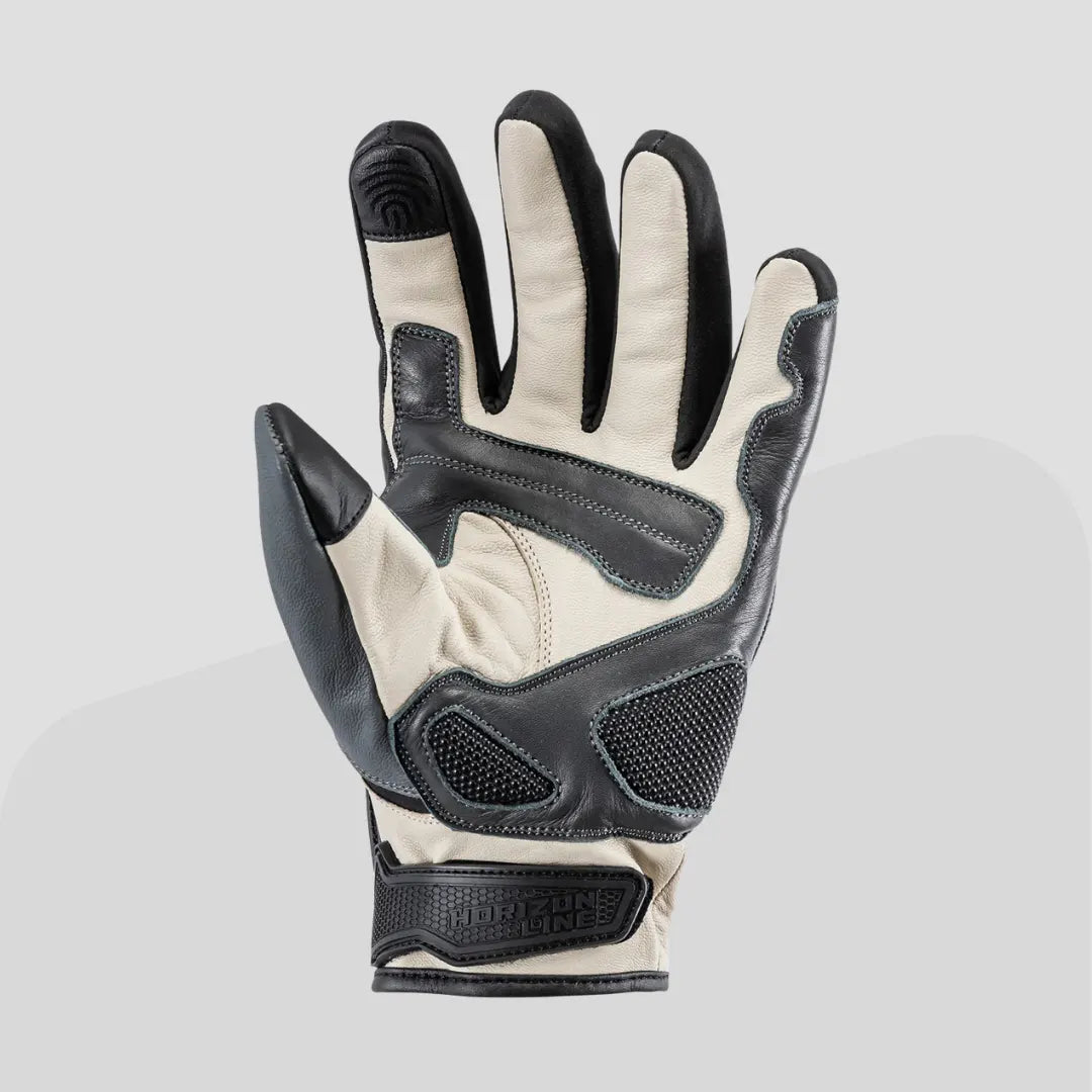 "Tour Master Horizon Line Trailbreak glove front view in white and black leather featuring TPR hook-and-loop closure, YKK zip gusset, and Superfabric palm slider."
