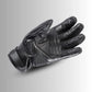 Tour Master Horizon Line Trailbreak glove front view in solid black goatskin leather with carbon-fiber knuckle protection and touchscreen-compatible fingertips