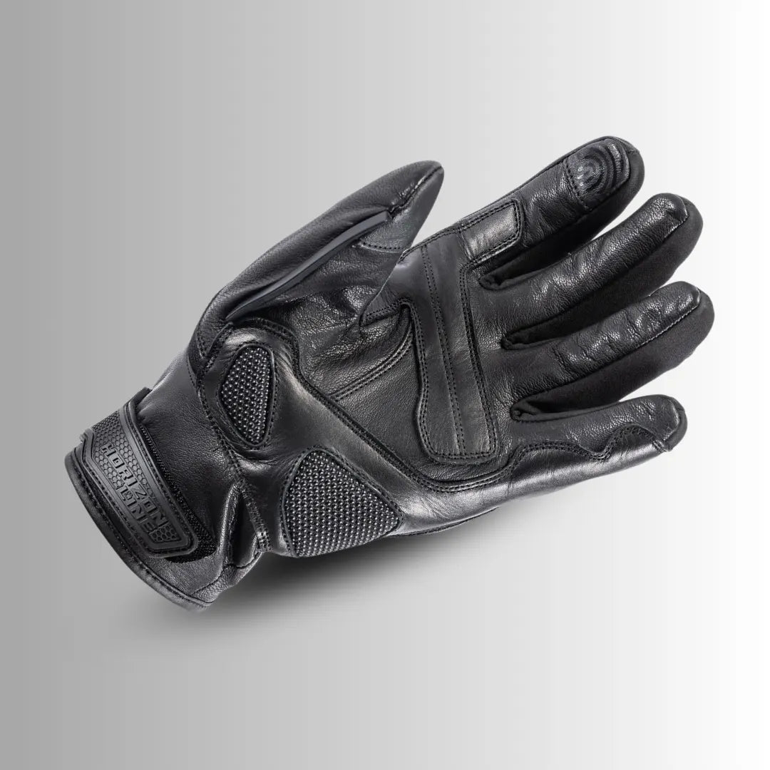 Tour Master Horizon Line Trailbreak glove front view in solid black goatskin leather with carbon-fiber knuckle protection and touchscreen-compatible fingertips