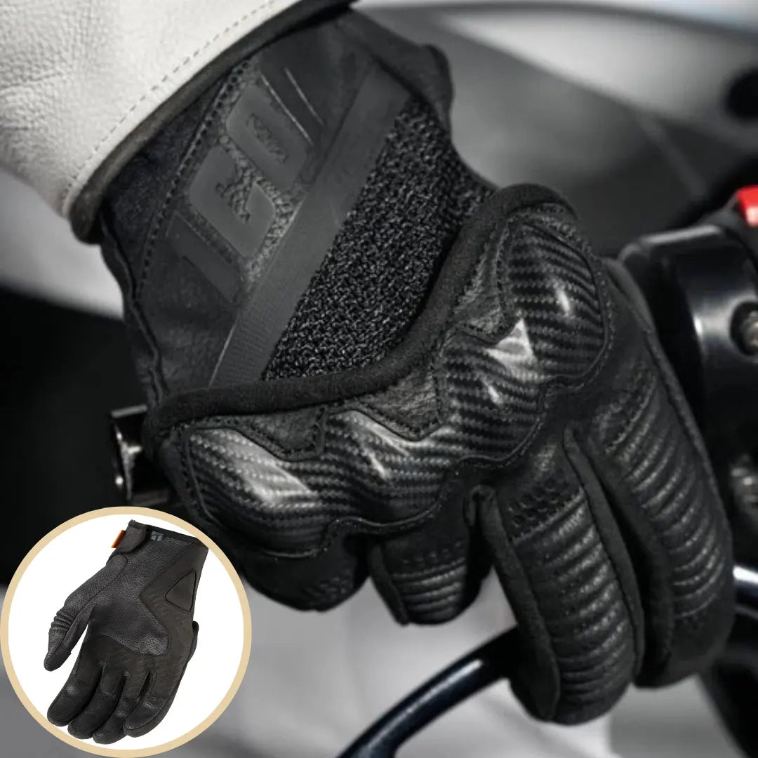 Close-up of a person's hand wearing a black Icon Contra 3 CE motorcycle glove, featuring carbon-look knuckle protection, mesh ventilation, and synthetic Ax Laredo palm material, holding onto a motorcycle handlebar. A smaller inset image shows a full view of the black Icon Contra 3 CE glove
