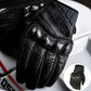 Pair of Icon Contra 3 CE gloves ready for motorcycle riding, reflecting classic sportbike style and modern protective features for street and touring.