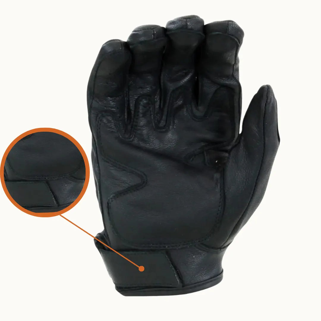 Palm view of MG knuckle-armoured leather gloves with textured grip and padded protection